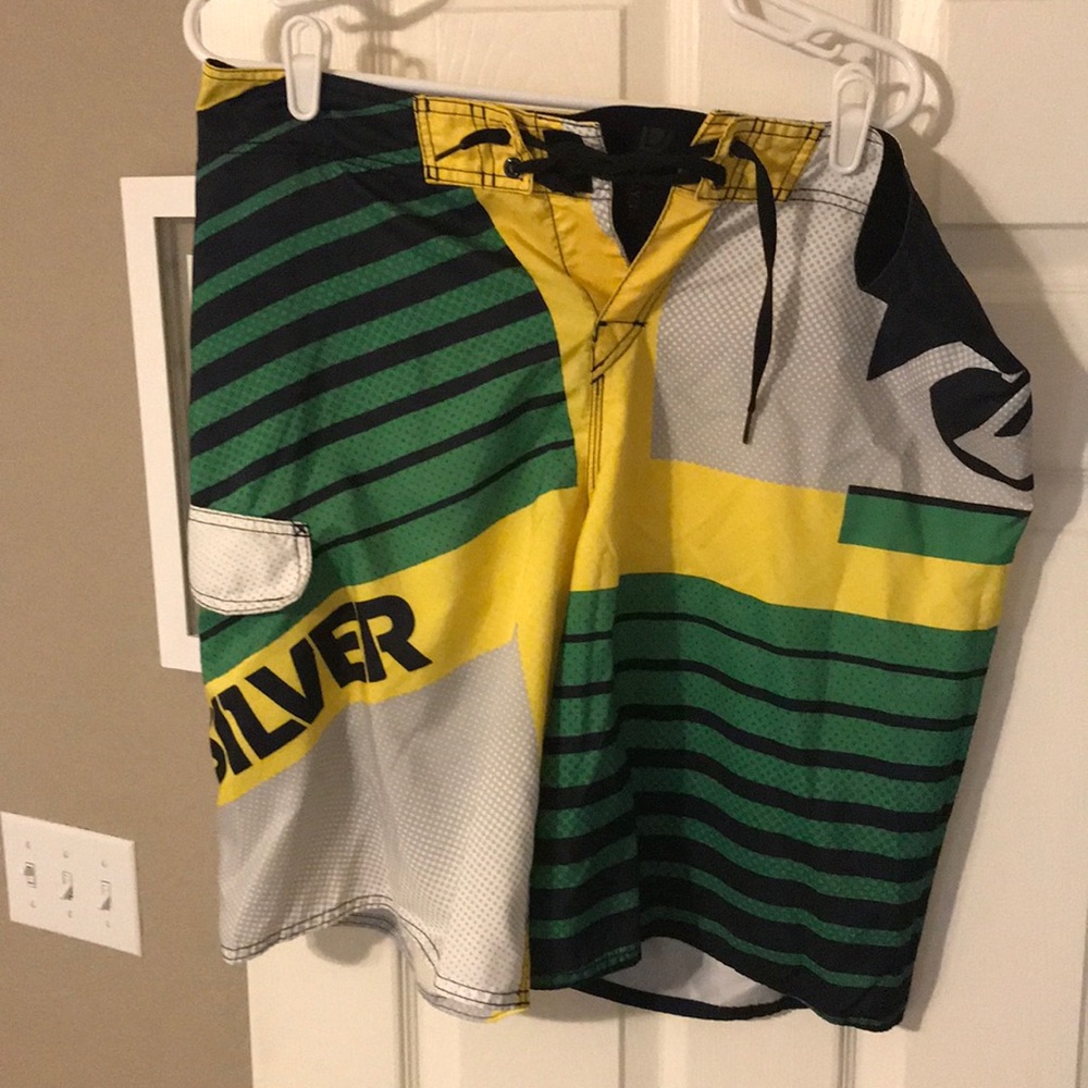 Quiksilver green/black/yellow/grey board shorts